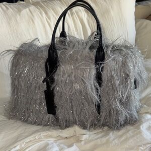 Marc Jacobs silver “The Creature” tote bag. Faux fur with leather trim.